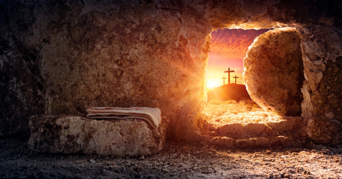 8 of the Most Important Events in the Bible A stone partially covers a tomb's entrance. Folded cloth rests in the tomb. Outside, the sun rises behind three crosses.